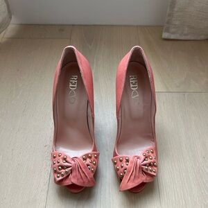 Brand new Pink Red Valentino Leather peep toe bow pumps.